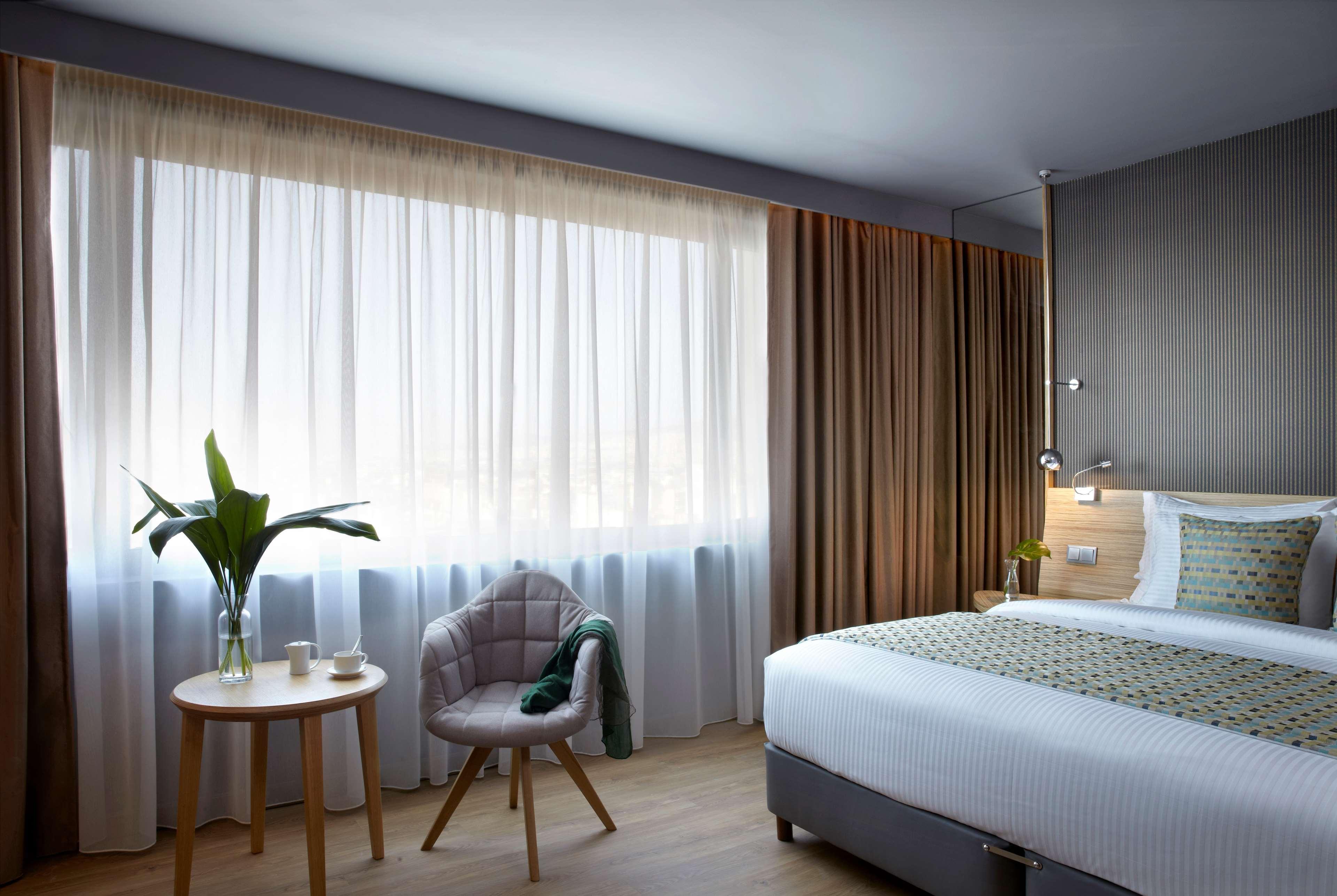 فندق ويندهام جراند أثينا المظهر الخارجي الصورة A room at the hotel