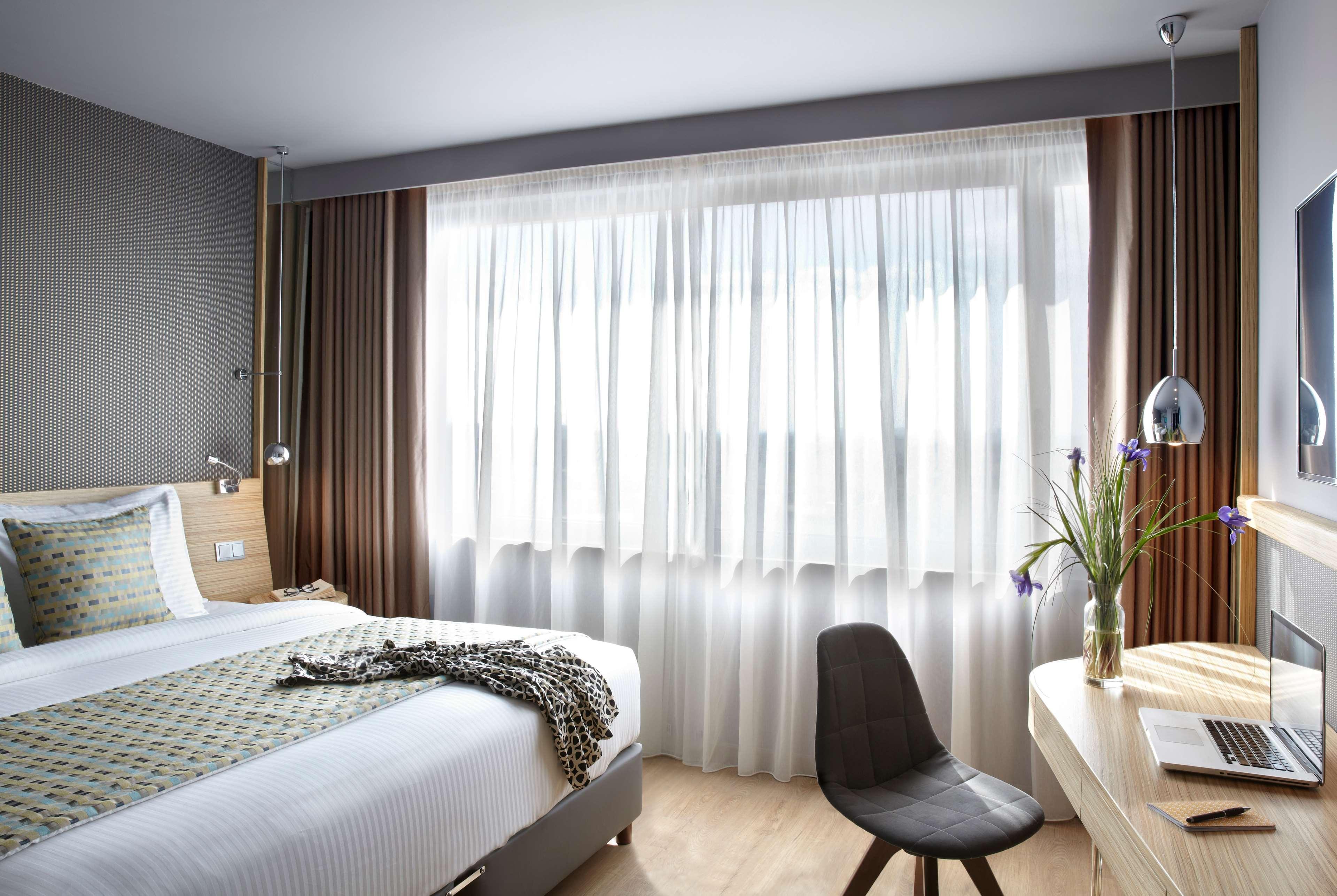 فندق ويندهام جراند أثينا المظهر الخارجي الصورة A room at the hotel
