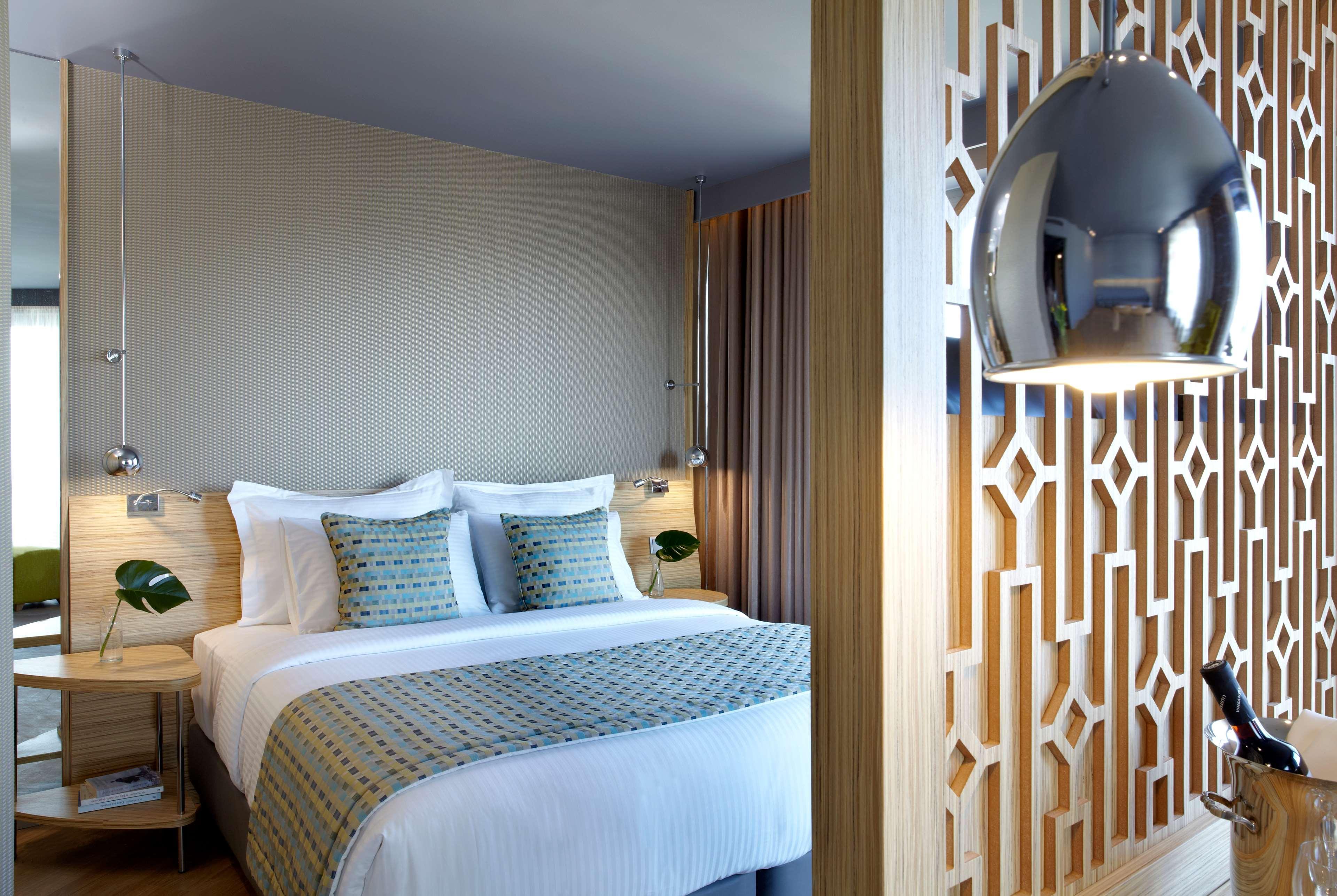 فندق ويندهام جراند أثينا المظهر الخارجي الصورة A bedroom at the hotel