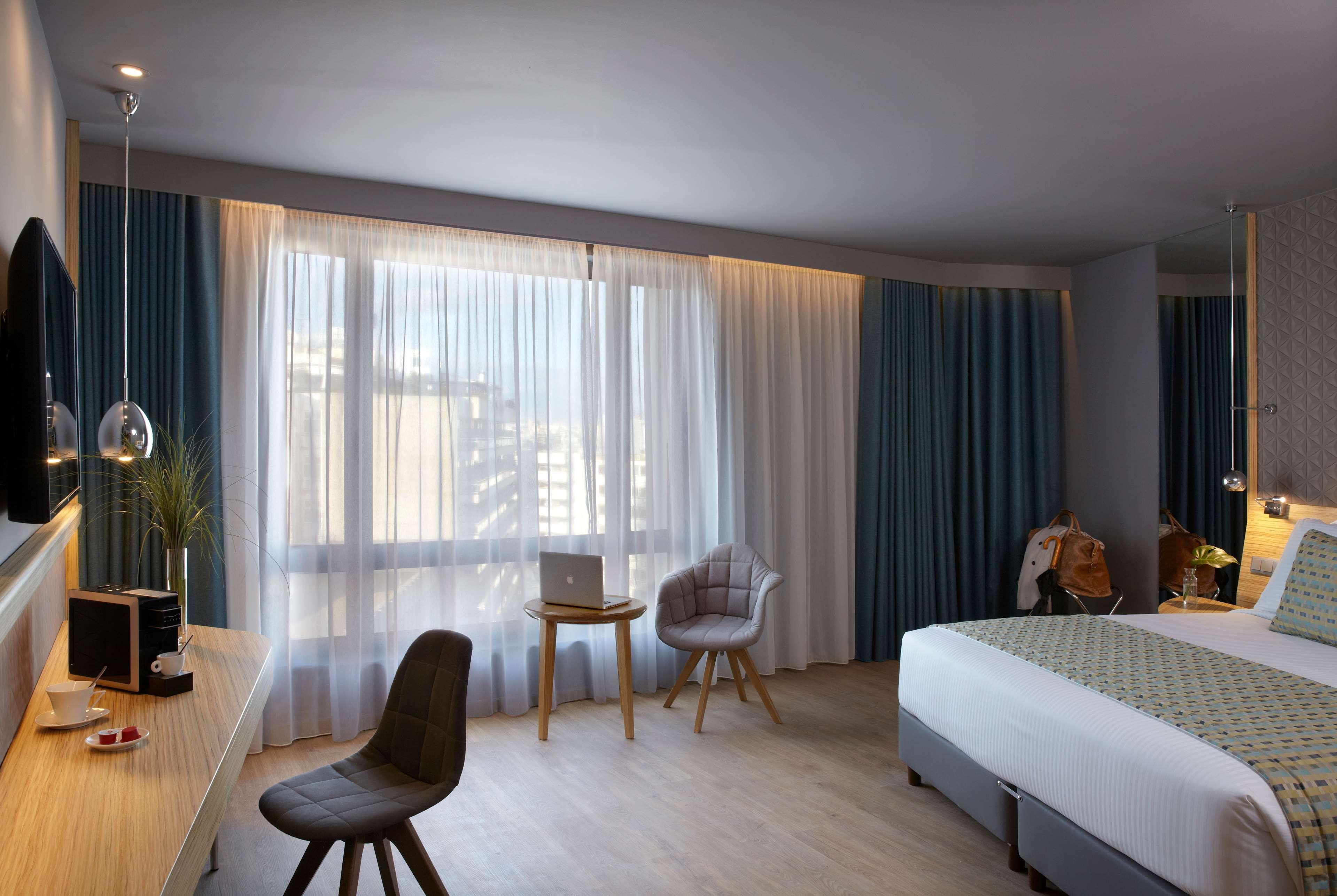 فندق ويندهام جراند أثينا المظهر الخارجي الصورة A room at the hotel
