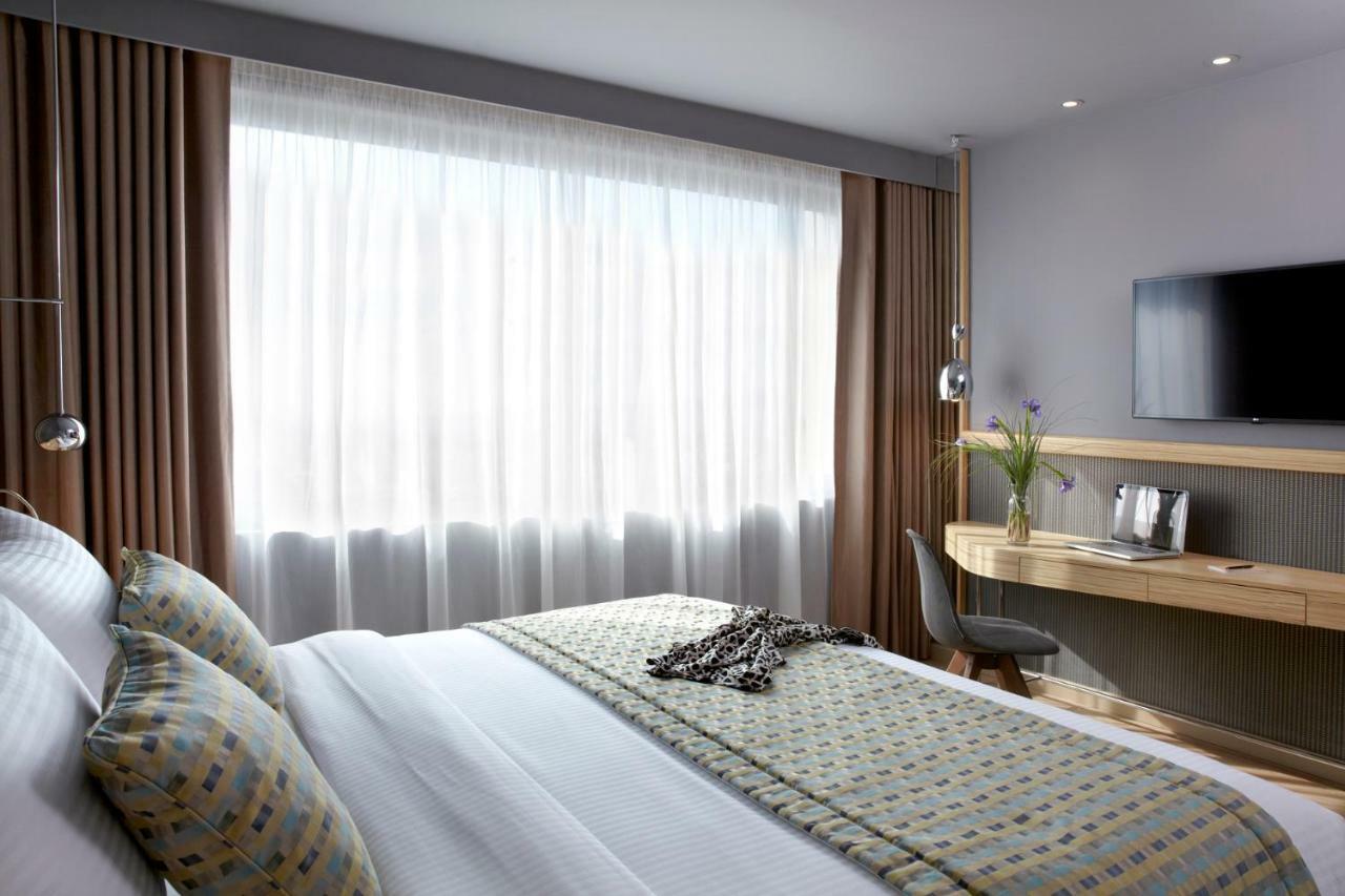 فندق ويندهام جراند أثينا المظهر الخارجي الصورة A bedroom at the hotel
